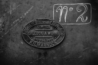 View showing makers plate for colliery locomotive which is inscribed 'ANDREW BARCLAY SONS & CO KILMARNOCK. CALEDONIA WORKS. LIMITED No. 1230. 1912'