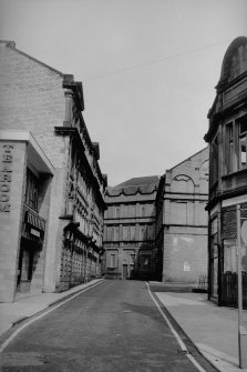 View from SE showing NE front (Croft Street front) of bonded warehouse with another bonded warehouse in background