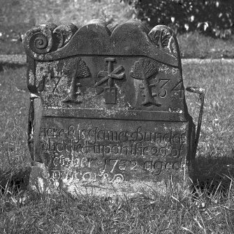 Detail of tombstone of forester with tools, Abercorn Church
