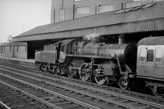 View from SSE showing locomotive with part of island platform building in background
