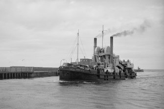 View looking W showing dredger returning from dumping spoil