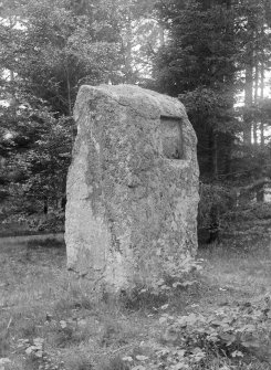 Standing stone with deep rectangular recess.
