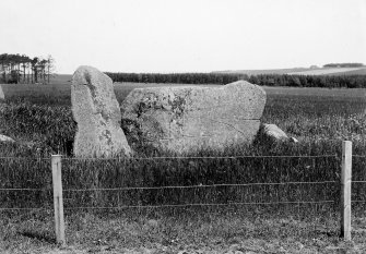 Recumbent stone and pillars viewed from outside the circle and from approximately the south.
Photograph taken on a different occasion from AB 2429, but probably on same date as AB 2941.