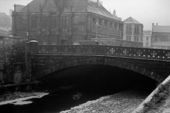 View from N showing NNE front of bridge with 121-123 Titchfield Street in background