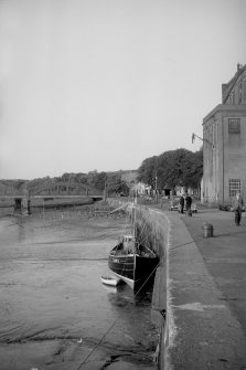 View looking ENE showing harbour with part of bridge on left and granary on right