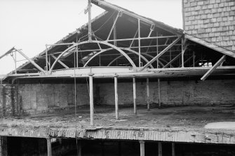 View showing roof trusses in old part