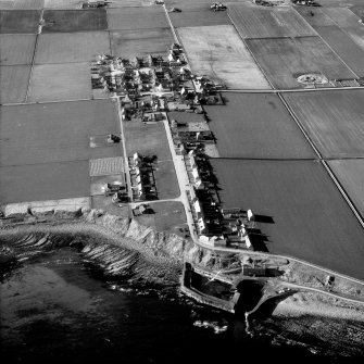 Aerial photograph showing village and harbour