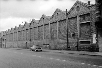 View from SSE showing SSW front of numbers 515-519 Shettleston Road