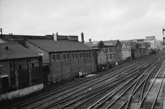 General view from E showing NE front (railway front) of works