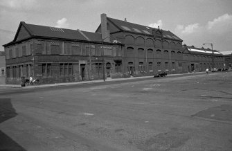 General view from WSW showing SSW front (French Street front) and part of WNW front (Norman Street front)