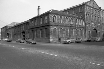 View from SE showing SSW and ESE fronts of works with part of warehouses on right