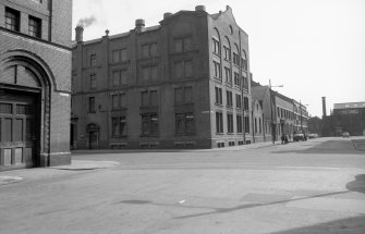 View from N showing WNW front and part of NNE front of works with doorway of depot in foreground