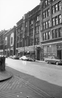 View from NW showing NNE front of Glass Warehouse with former Church in background and part of Leather Warehouse in foreground