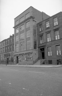 View from S showing SSW front of warehouse with numbers 186-190 in foreground and number 200 in background