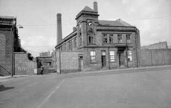 View from SSE showing SE front and part of SW front of office block