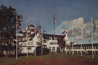 Colour postcard view of rear facade with control tower.