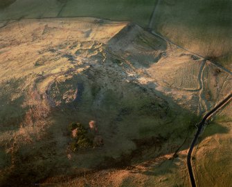 Oblique aerial view of Dreva Craig centred on the reamins of a fort, taken from the ESE.
Digital image of D/69846/CN.