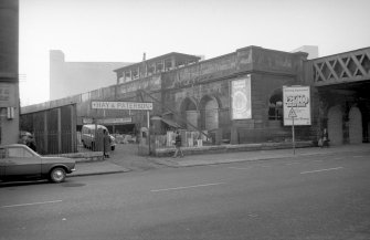 View from NE showing N front and part of ENE front of N end of station with part of bridge on right