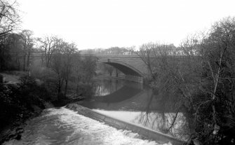 View from SE showing SE front of bridge with weir in foreground