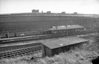 View from NW showing WNW front of station building with part of tram depot in background