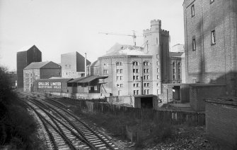 View looking NNW along bridge with Scotstoun Mills in background and part of Regent Flour Mills on right