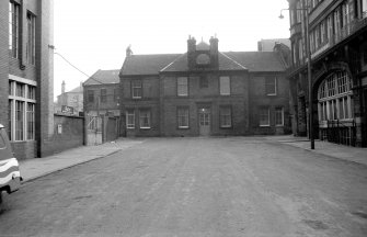 View from NNW showing NNW front of offices with part of stationery works on right