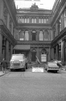 View looking WNW showing ESE front of central part of warehouse with courtyard in foreground