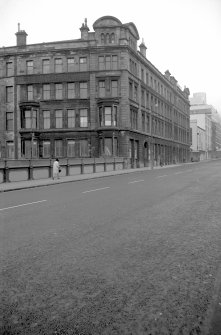 View looking E from bridge showing SSW front and part of W front of warehouse