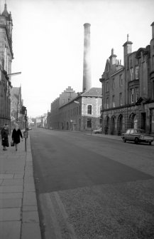 View from SSW showing W front (Kinnoull Street front) and part of S front (Mill Street front) of works with part of 31-33 Kinnoull Street in foreground