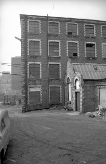 View from ESE showing part of ESE front of main block with part of small engine house in foreground