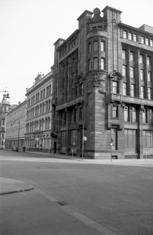 View from NW showing NNE front and part of WNW front of McGeoch's Building with numbers 19-5 Cadogan Street in background