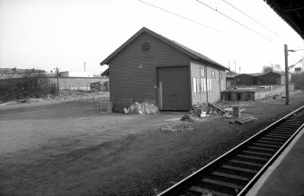 View from N showing NNE and WNW fronts of goods shed