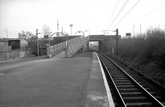 View from NNE showing ramp from road overbridge