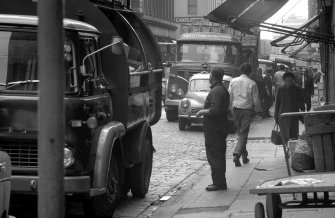 View showing street scene round fruit market