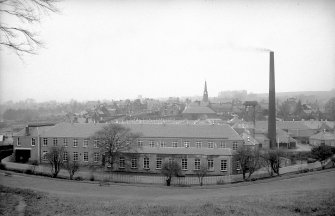 General view from SE showing SSE front of S block with chimney on right