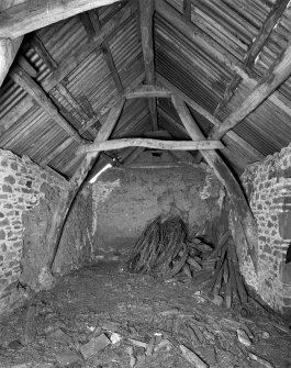 Canonbie, Priorslynn Farm, cruck-framed building, interior view. Typical cruck truss and clay partition.