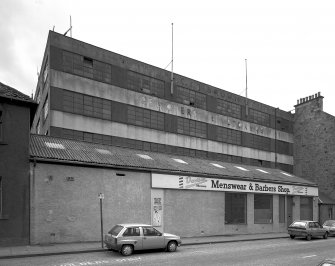 General oblique view of the street frontage of C&J Brown's warehouse seen from the North.
Scanned image of B 30151.