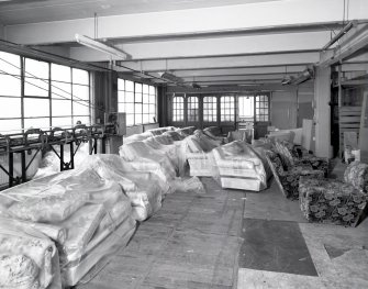 Interior view of the first floor of the main block of C&J Brown's warehouse seen from the West.