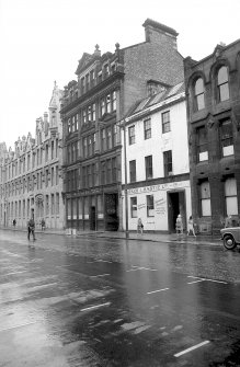 View from SW showing WNW front of number 110 Brunswick Street with number 106 Brunswick Street in foreground and part of Campbell's Warehouse in background