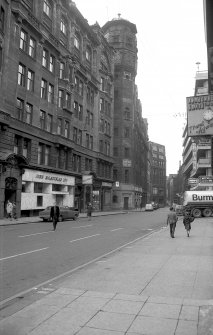 View from N showing part of WNW front of numbers 78-94 Mitchell Street with printing works in background