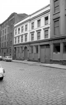 View from ENE showing ESE front of store with part of warehouse on left