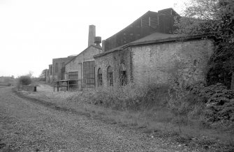 General view from N showing ENE front and part of NE front of foundry