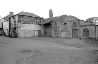 View from S showing SW front of E block with central block on left