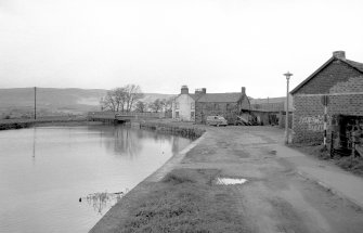 View from SSW showing basin with bridge, house and building in background