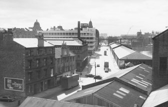 View looking WSW from Randolph and Elder Engineering Works showing NNE and ESE fronts of numbers 99-103 Kingston Street with numbers 109-113 Kingston Street in left background and part of Kingston Dock in right background