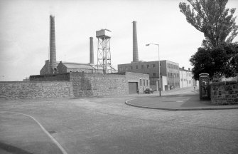 View from NW showing chimneys, tank and part of works