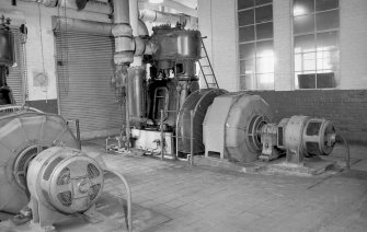 Interior
View showing 250 kw Belliss and Morcom and Bruce Peebles alternator set with part of 150 kw Belliss and Morcom and Bruce Peebles alternator set in foreground