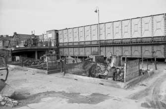 View from SW showing WSW front of water tank with low washers in foreground