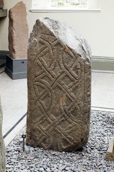 Copy of colour slide showing detail of cross shaft in Whithorn Priory museum-
Insc: "Cross shaft no 13 (back) ?11 cent."
NMRS Survey of Private Collection 
Digital Image Only