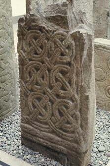 Copy of colour slide showing detail of cross shaft in Whithorn Priory museum-
insc: "  Cross shaft no 19 (front) ?11 cent."
NMRS Survey of Private Collection 
Digital Image Only